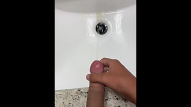 Teen squirts into the sink while parents are home