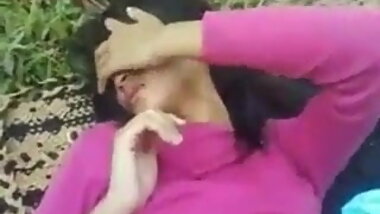 Couple having pleasuring sex outdoor