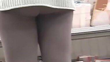 Teen booty in grey spandex teasing