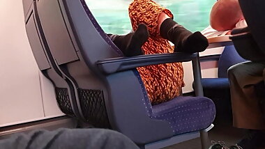 Black socks and ass in a train