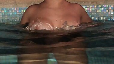 PLAYING WITH MY TITS AT HOTEL POOL