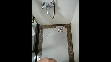Teen Asian boy pissing when he shower