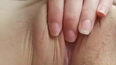 Skinny teen exposing her shaved pussy