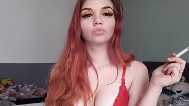 Smoking and exhaling the smoke on the nose