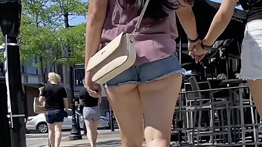 Hot Young lesbian couple in booty shorts showing ass cheeks