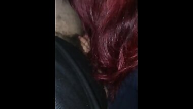 Red Head Latina in Car